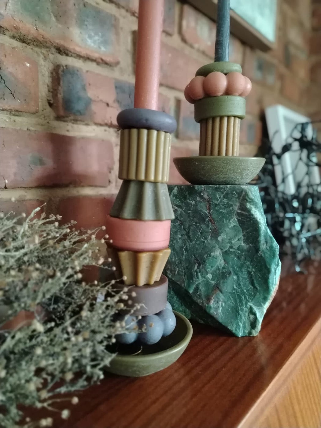 Candles on mantelpiece