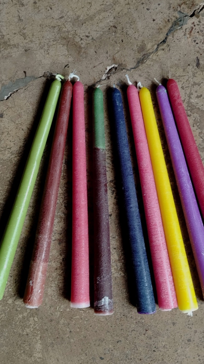 Taper candles in various colors