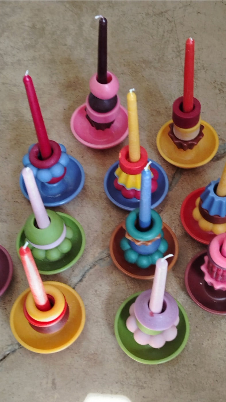 Collection of various stackable candles
